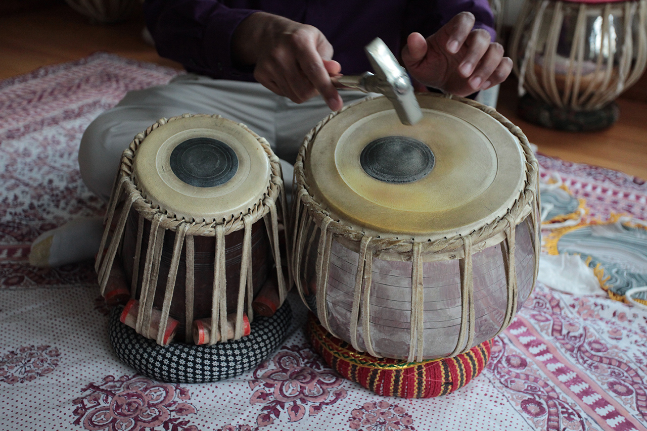 Playing the drums.