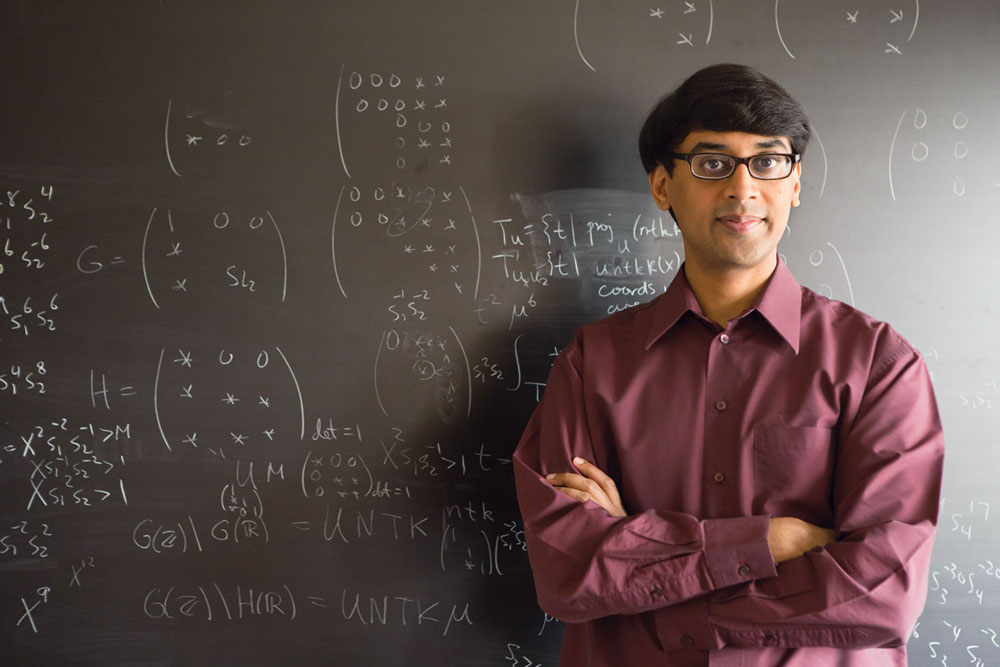 Photo of Manjul Bhargava at his blackboard