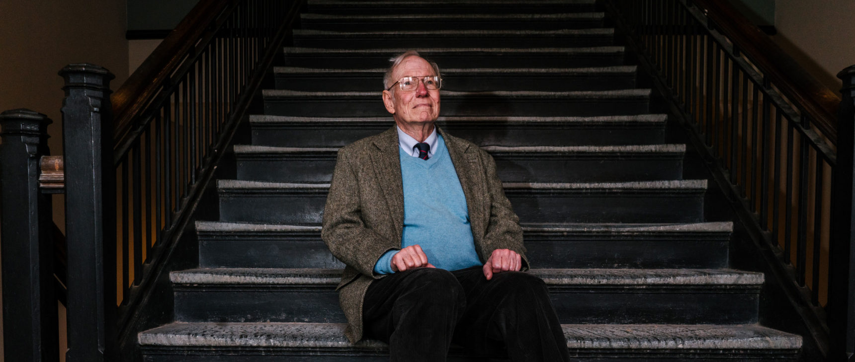 Dr. Jason Morgan, a geophysicist, poses for a portrait in Guyot Hall, home of the geosciences department at Princeton University. He has since retired and moved to Boston, where he is a visiting scholar at Harvard. The steps in the stairwell are made of Serpentine rock, which is formed in the Earth's mantle.