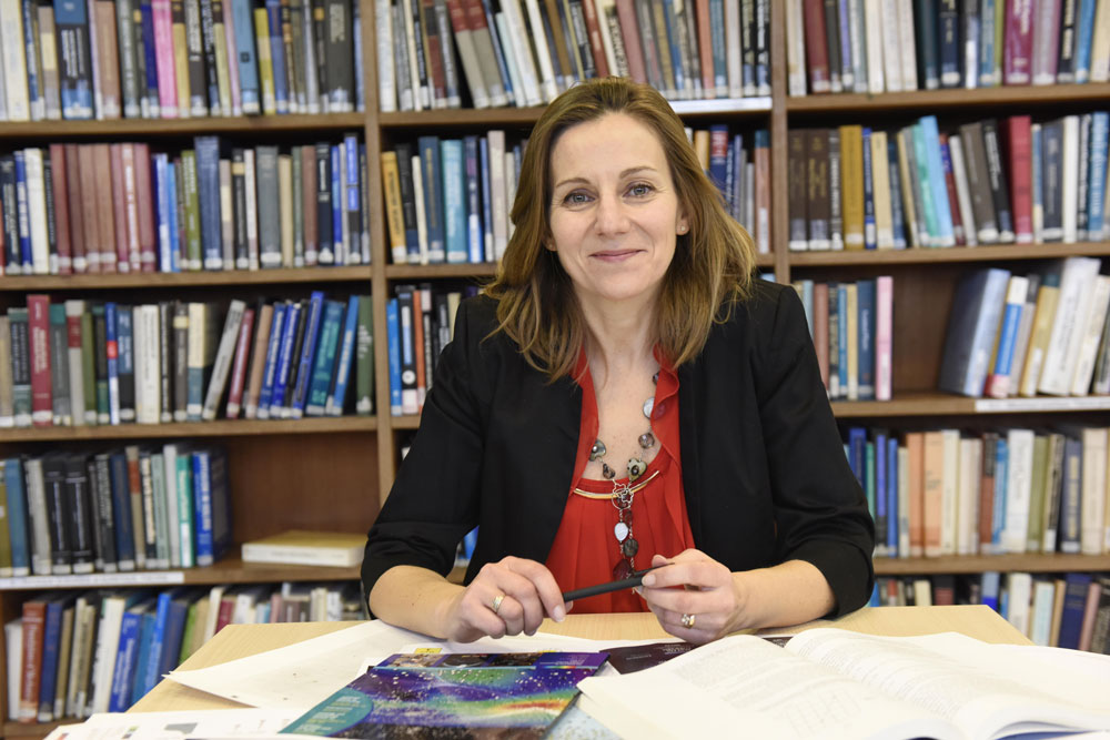 Hélène Courtois, an astronomer at the University of Lyon, maps cosmic structure by examining the flow of galaxies