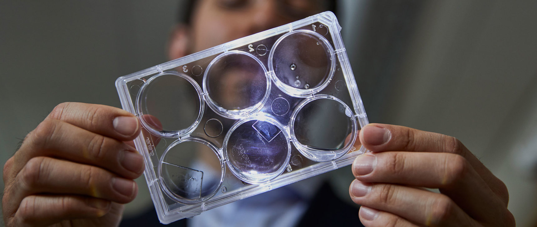 HP photo of Ed boyden holding samples