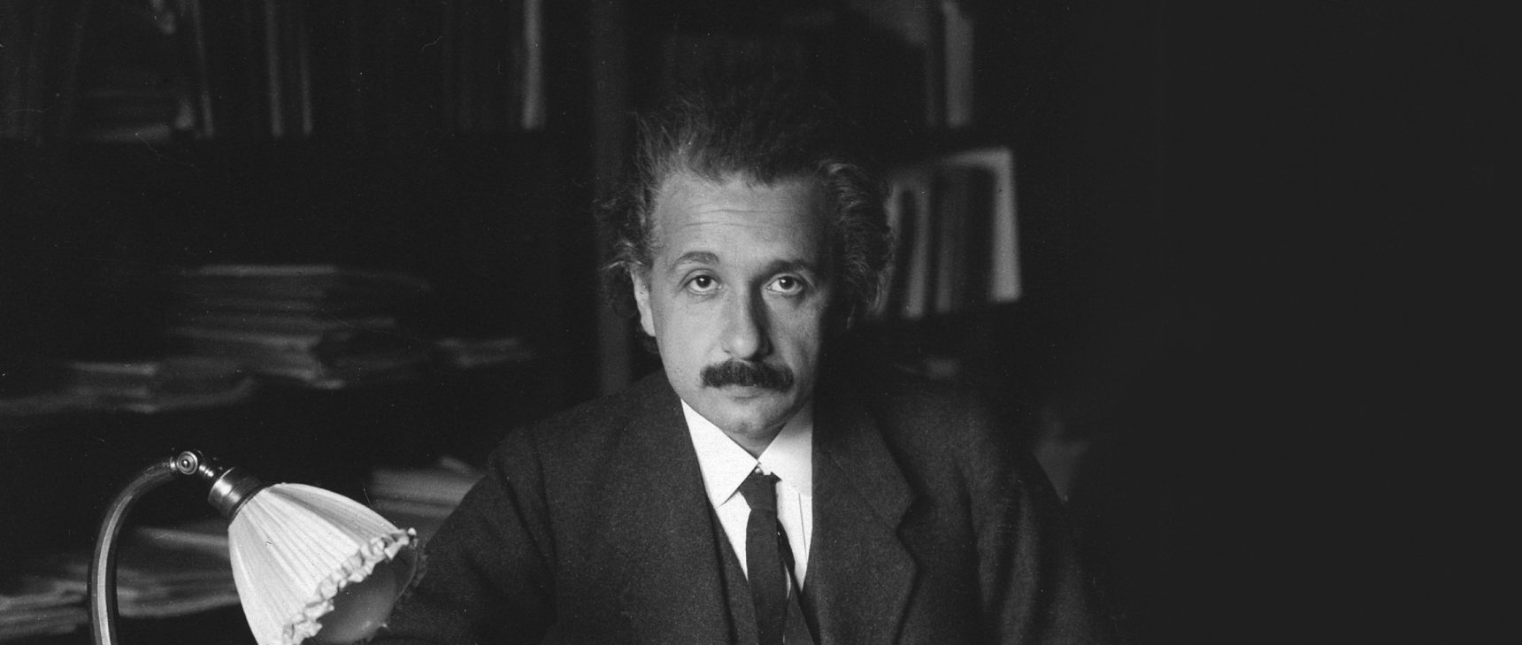 Photograph of Albert Einstein in his office at the University of Berlin, published in the USA in 1920.