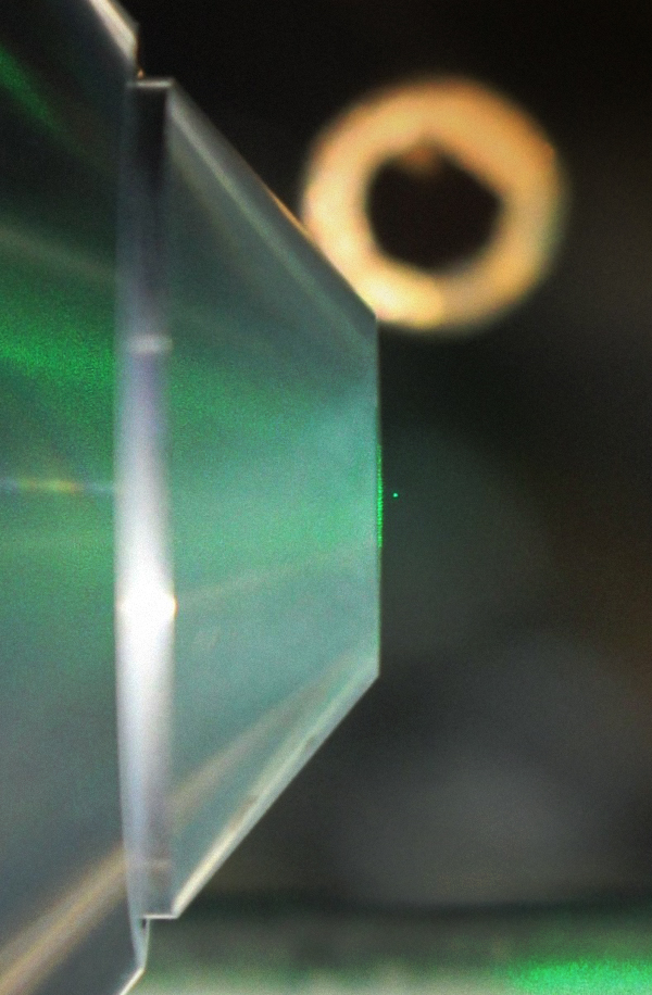 levitating nanodiamond (green dot)