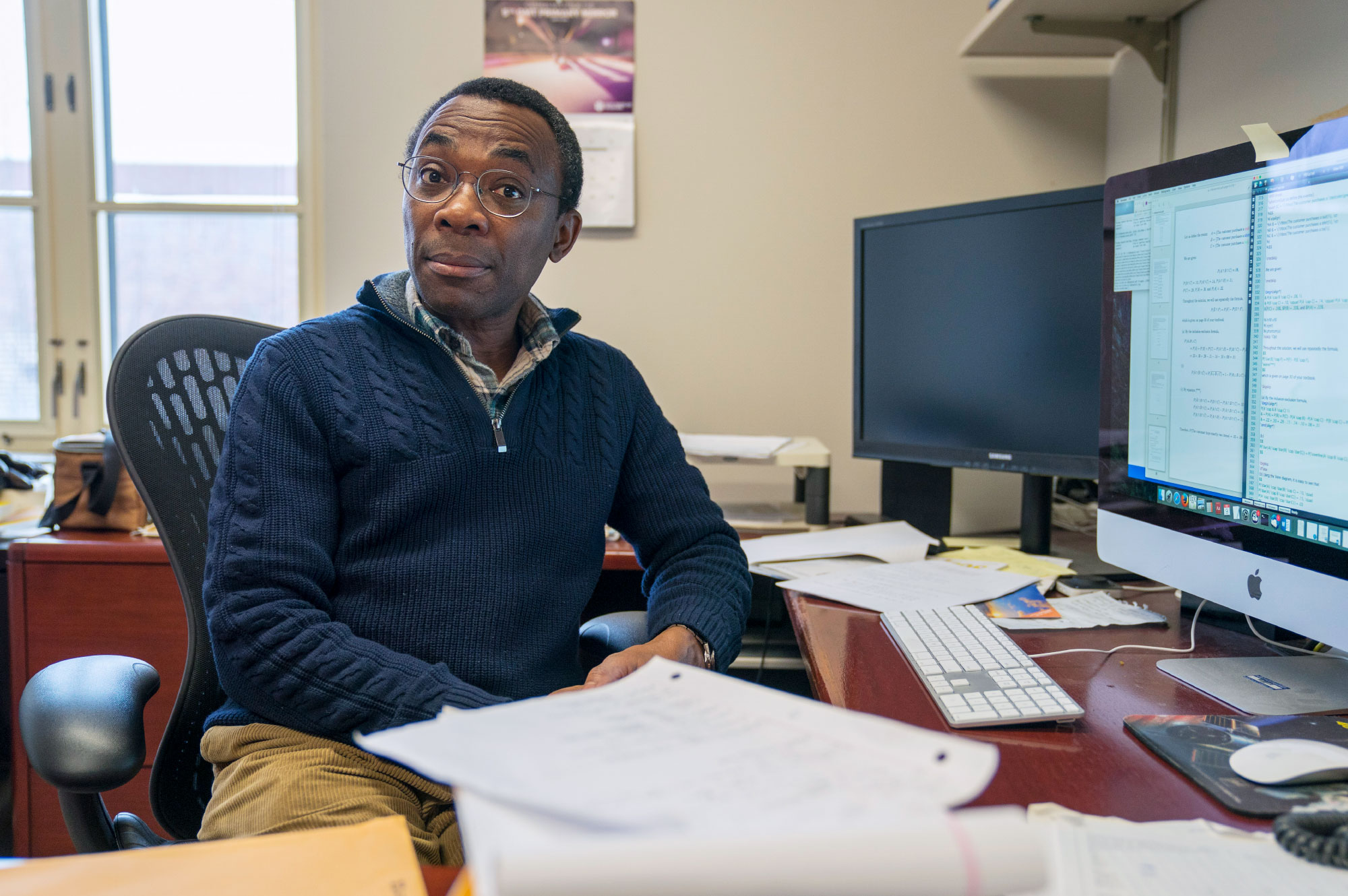 Photo of mathematician Donald Richards in his Pennsylvania State University office.