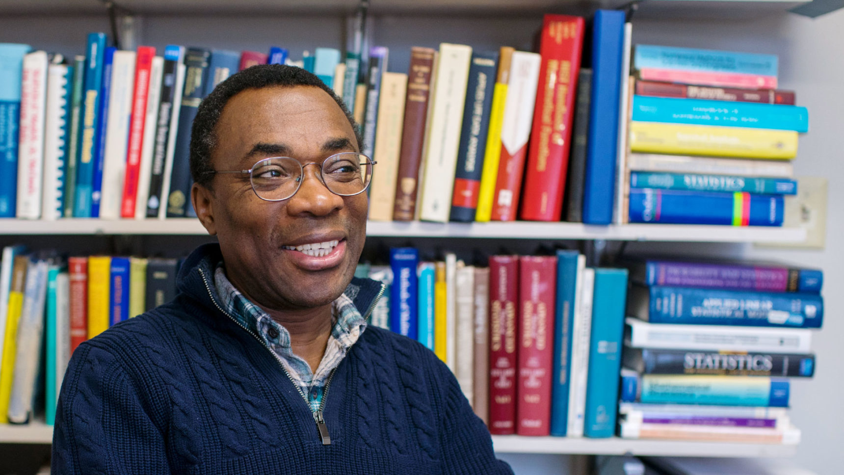 Photo of mathematician Donald Richards in his Pennsylvania State University office.