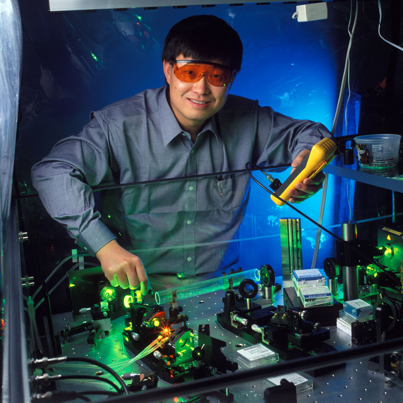 Photo of Jun Ye in his lab