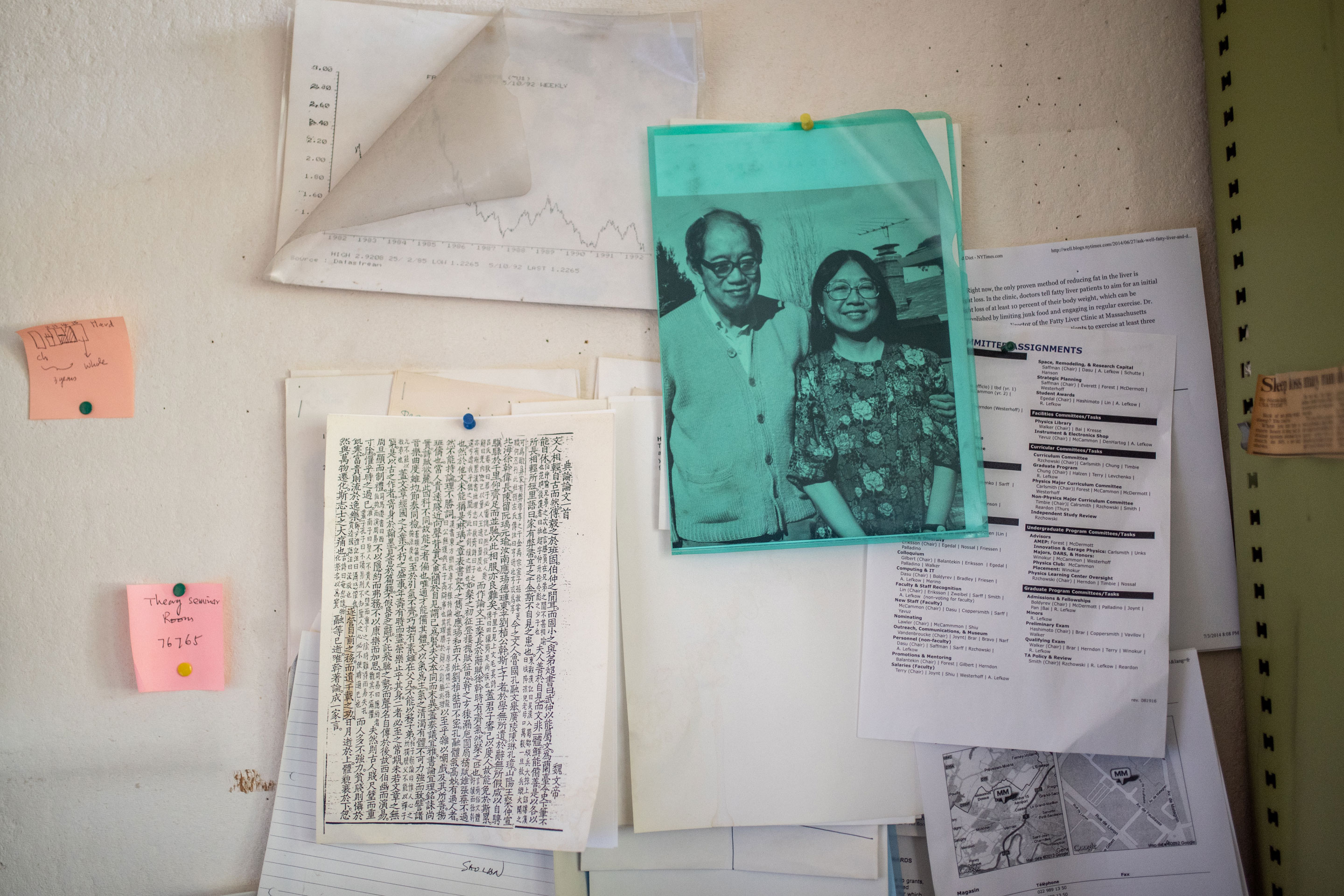 Photo of Sau Lan Wu and her husband at her office at CERN