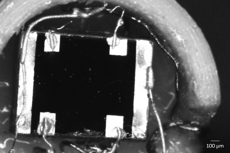 Thin-film sample of a cuprate crystal called bismuth strontium calcium copper oxide, mounted for resistivity measurements at the LNCMI in Toulouse, France.