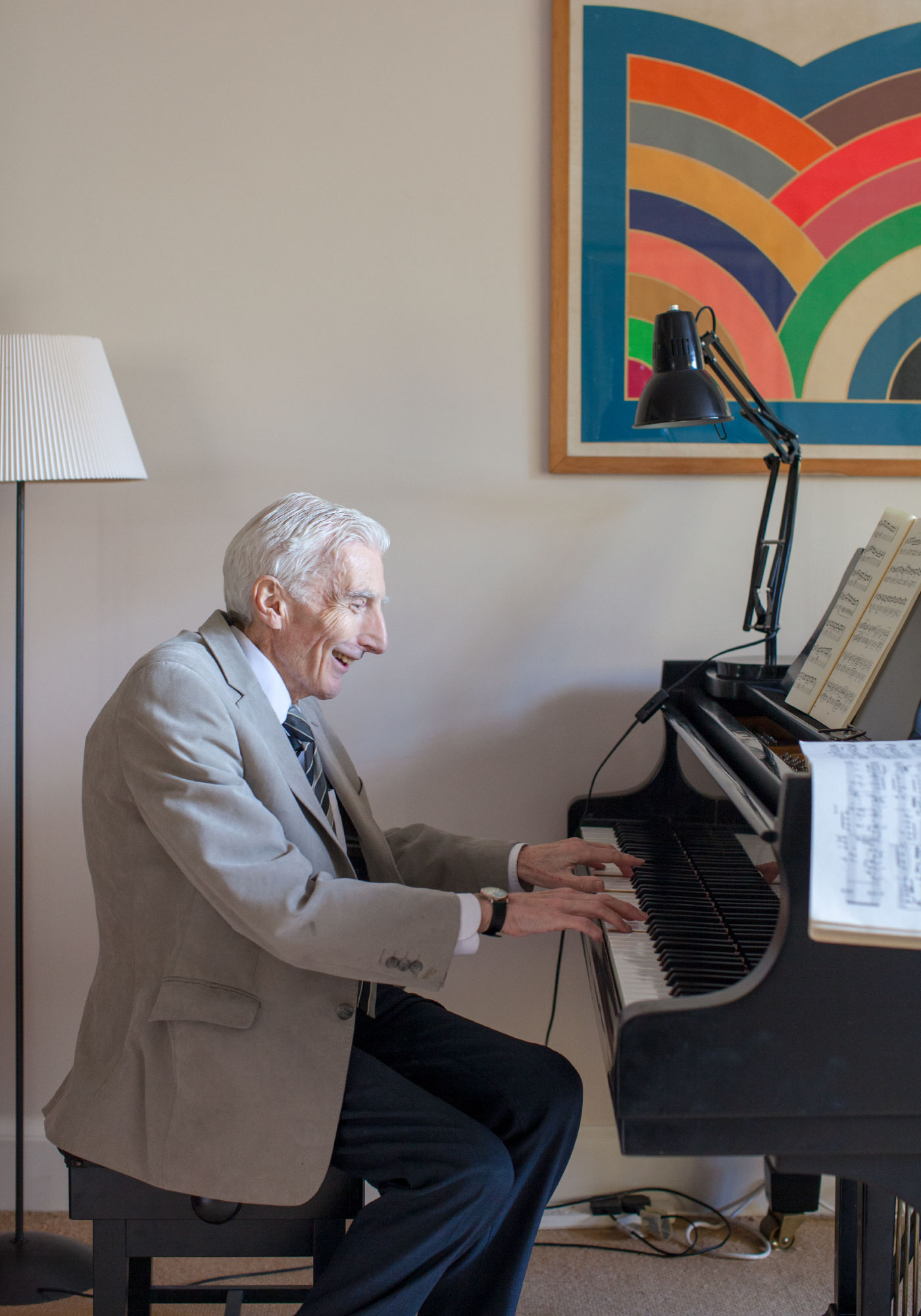 Martin Rees playing the piano in his home in Cambridge, England.