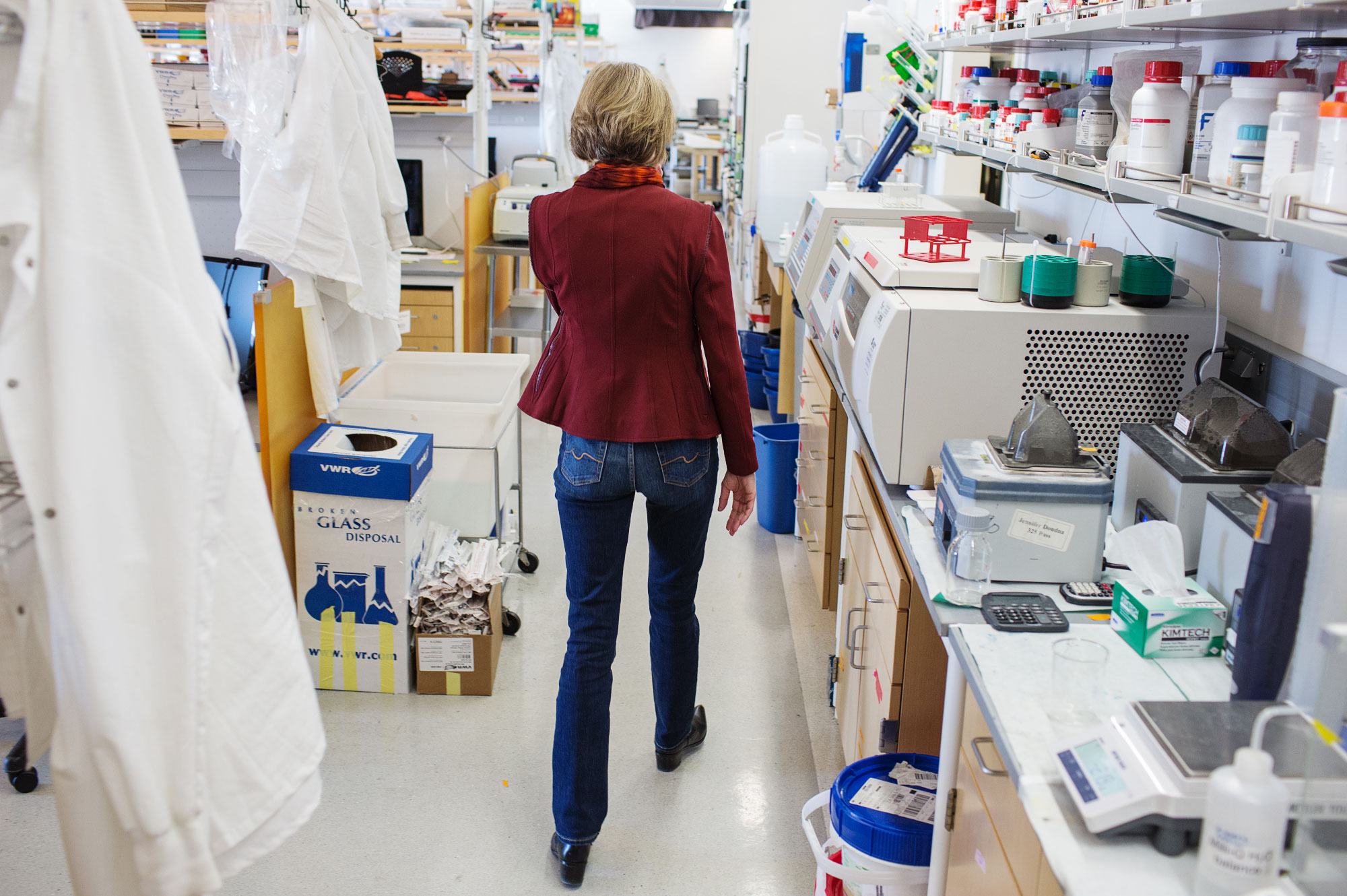 PHOTO: Doudna walks in her lab