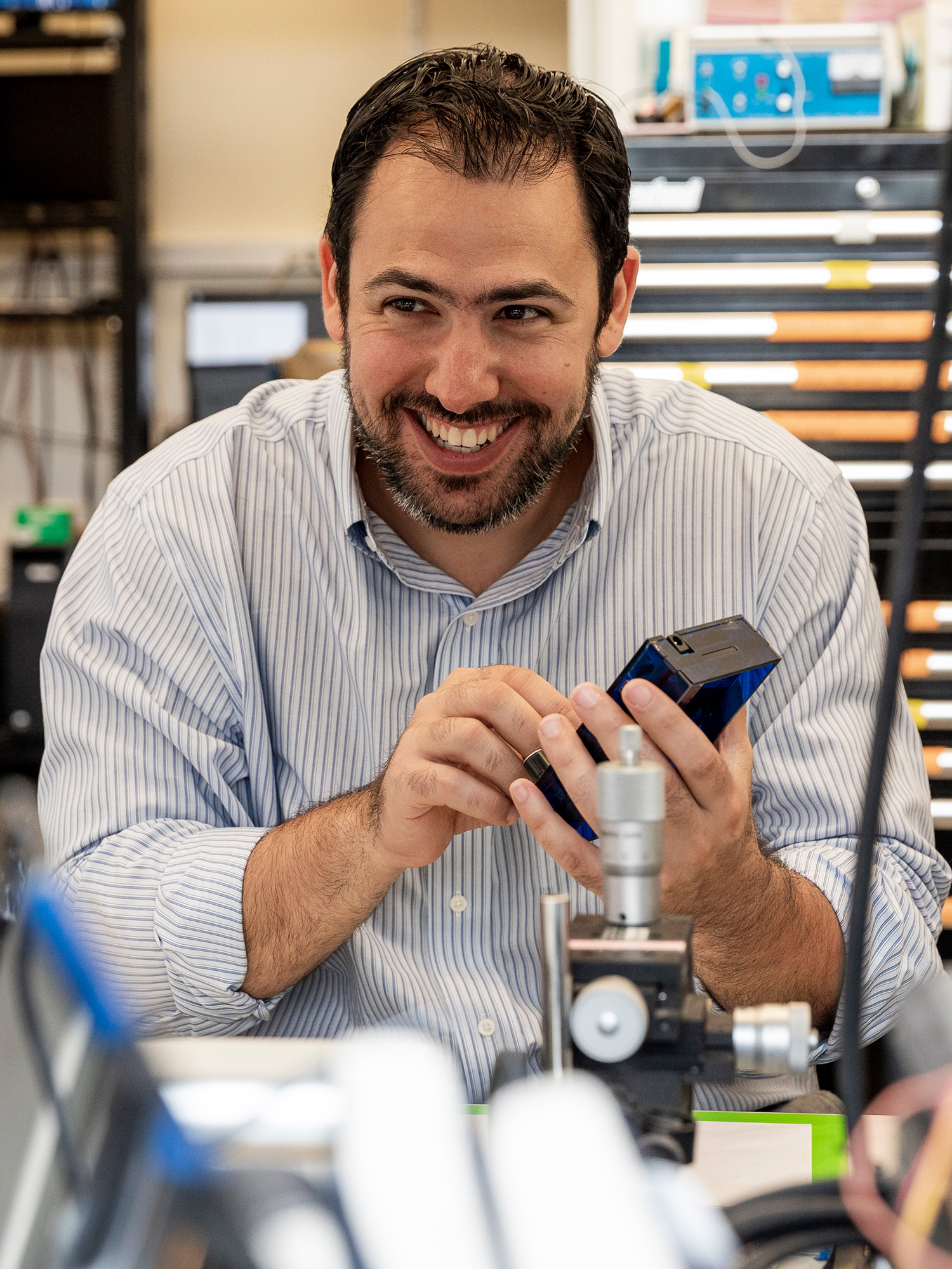 Portrait photograph of Michael Halassa in the lab.