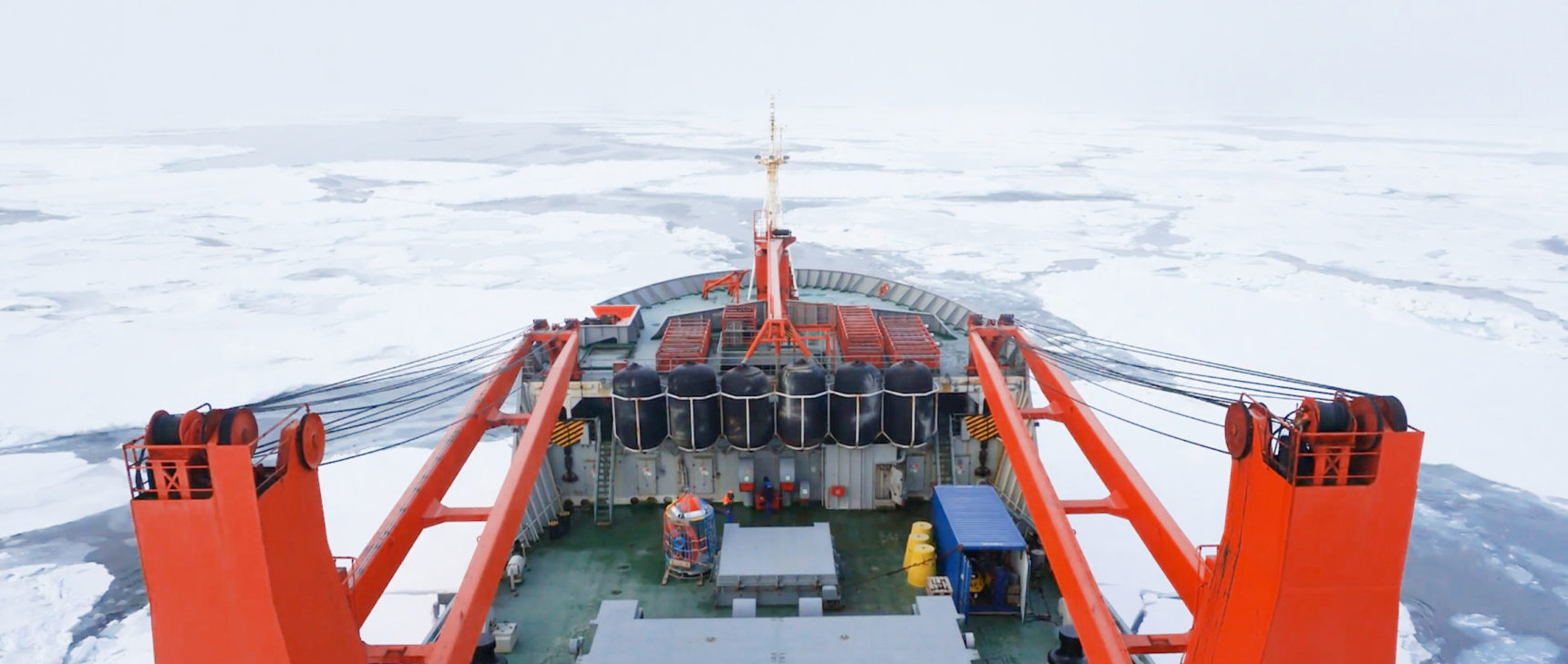 Video of an icebreaker moving through ice floes.