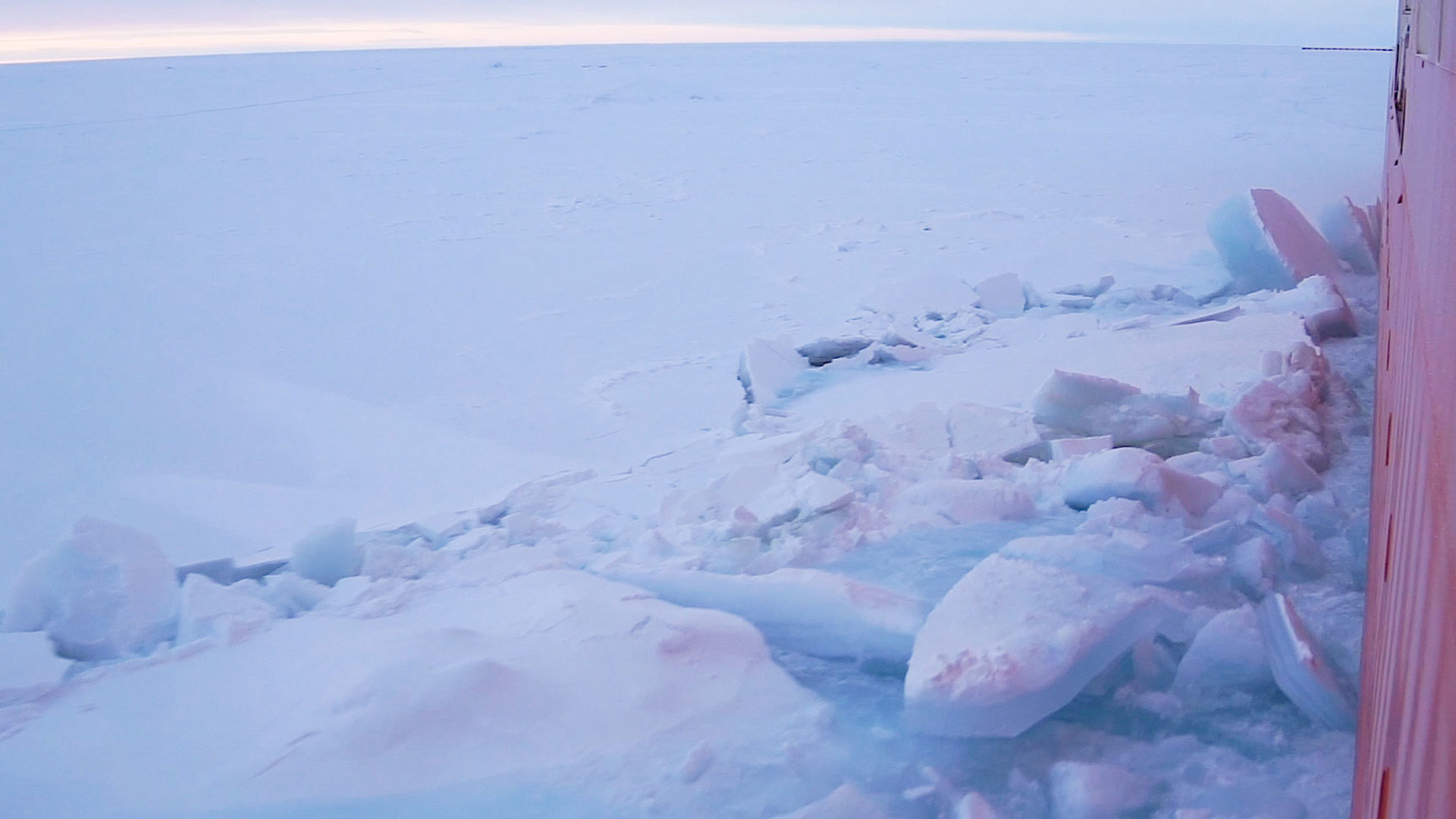 Video of an icebreaker moving through ice.