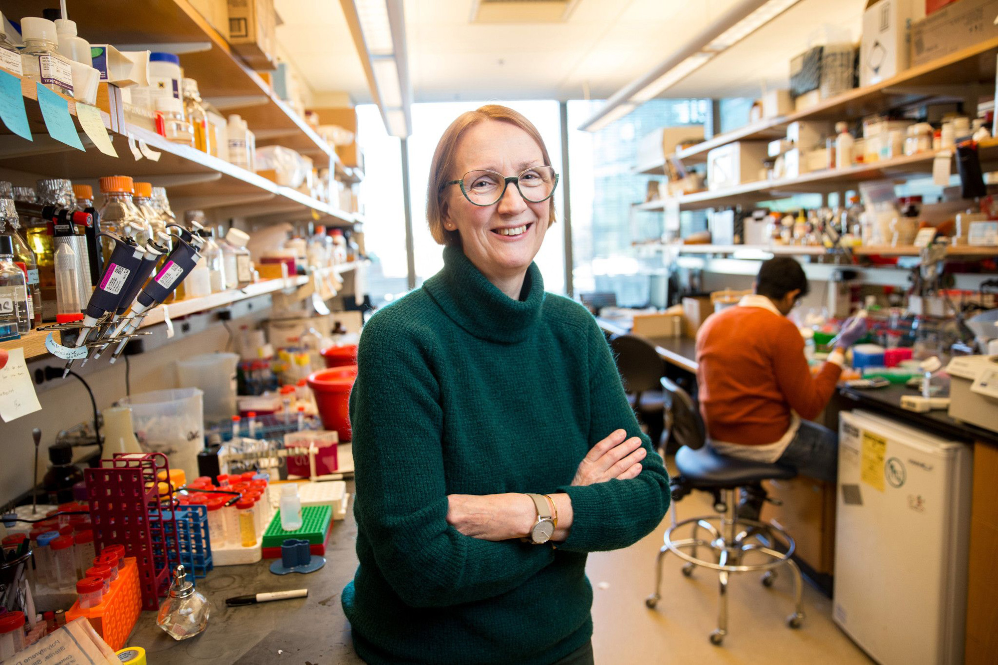 Photograph of Jeantine Lunshof in a laboratory.