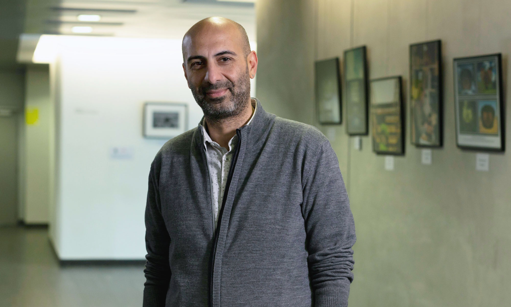 Portrait photo of Bassem Hassan in his laboratory.