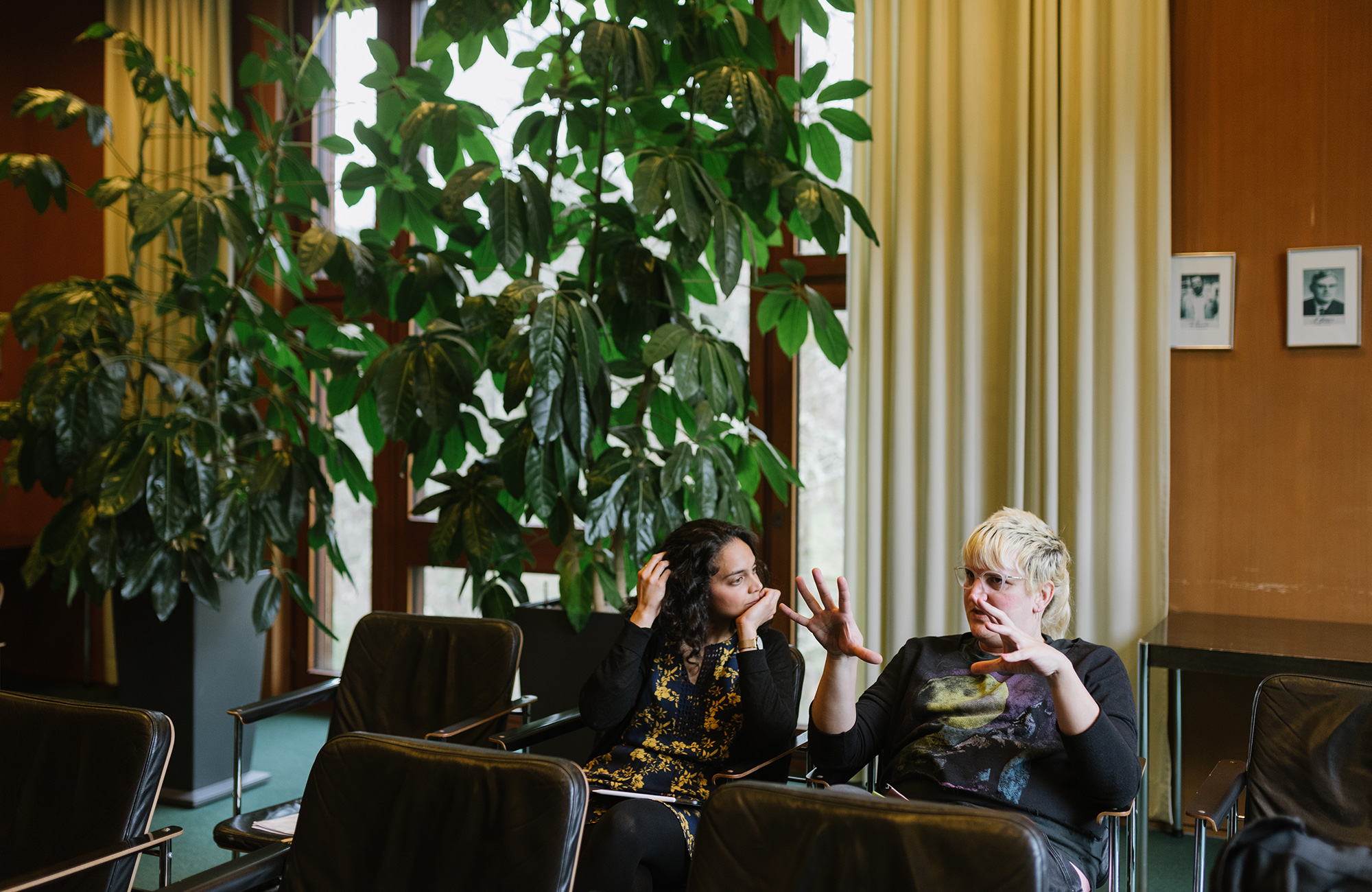 Photo of Priyam Patel and Autumn Kent sitting and talking