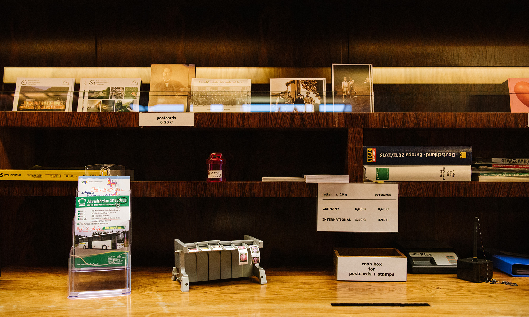 Photo of the welcome desk at Oberwolfach, including postcards and stamps for sale