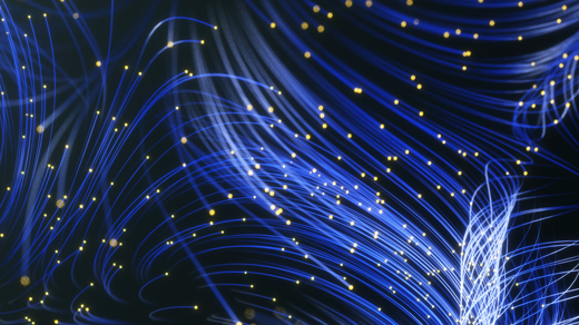 Animation showing multiple particles of light flowing together and leaving blue trails