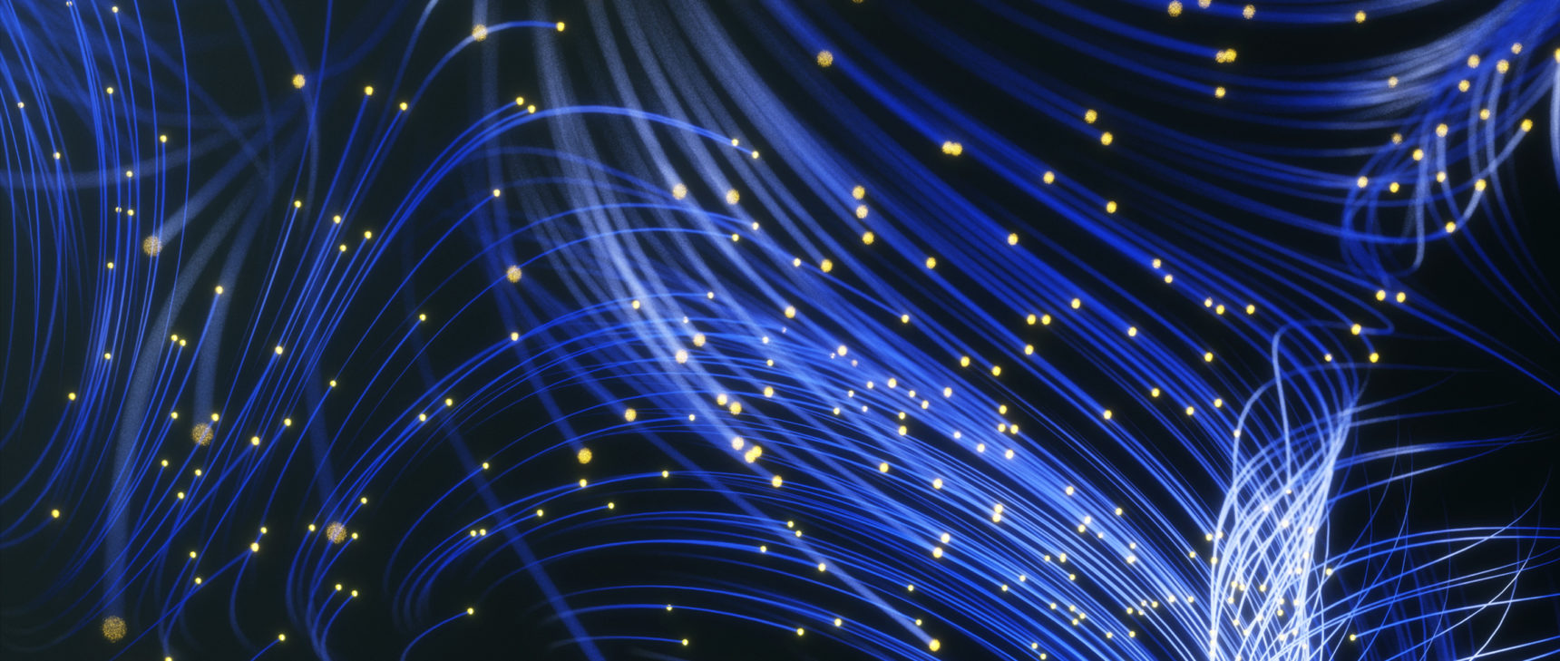 Animation showing multiple particles of light flowing together and leaving blue trails