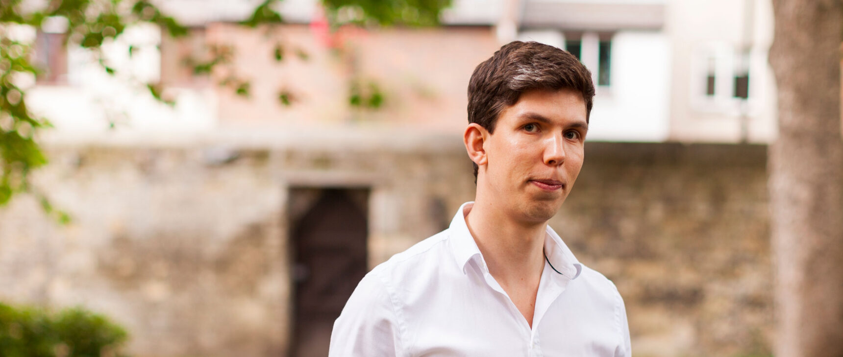 A photograph of the mathematician James Maynard outside his home in Oxford, England.