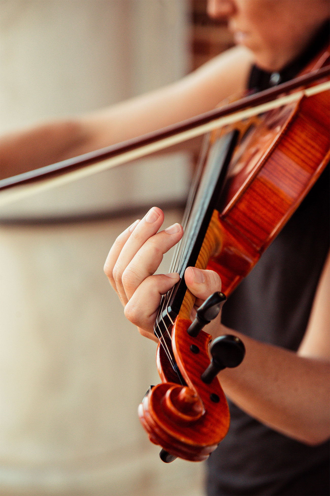 Closeup of Riehl playing the viola.