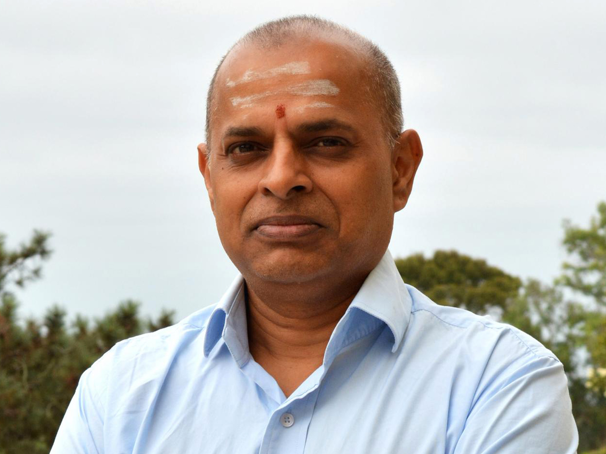 Portrait photo of Ramanarayanan Krishnamurthy of the Scripps Research Institute.