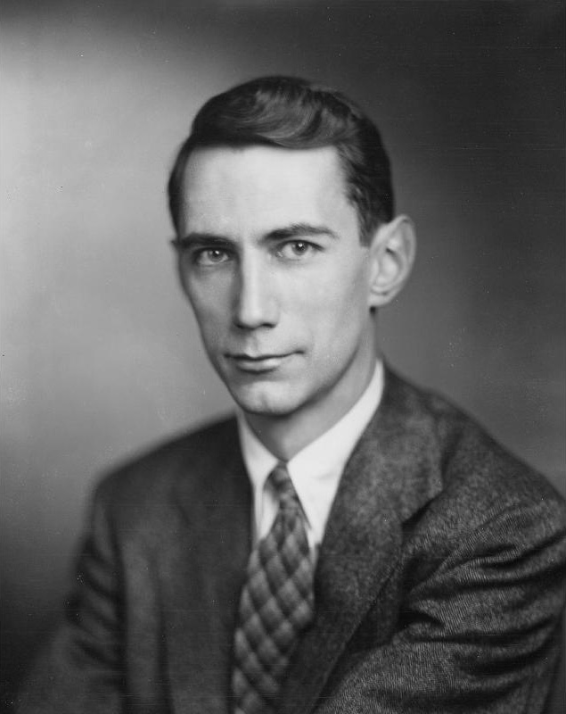 Black and white photo of a young Claude Shannon posing for the camera