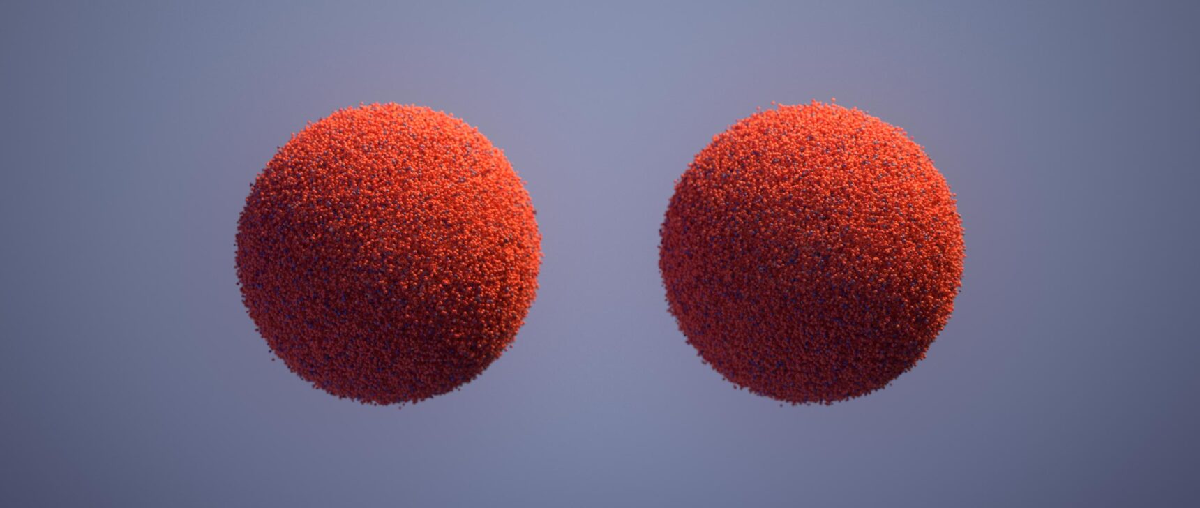 An orange ball decomposing into points and rematerializing as two balls, each the same size as the first.