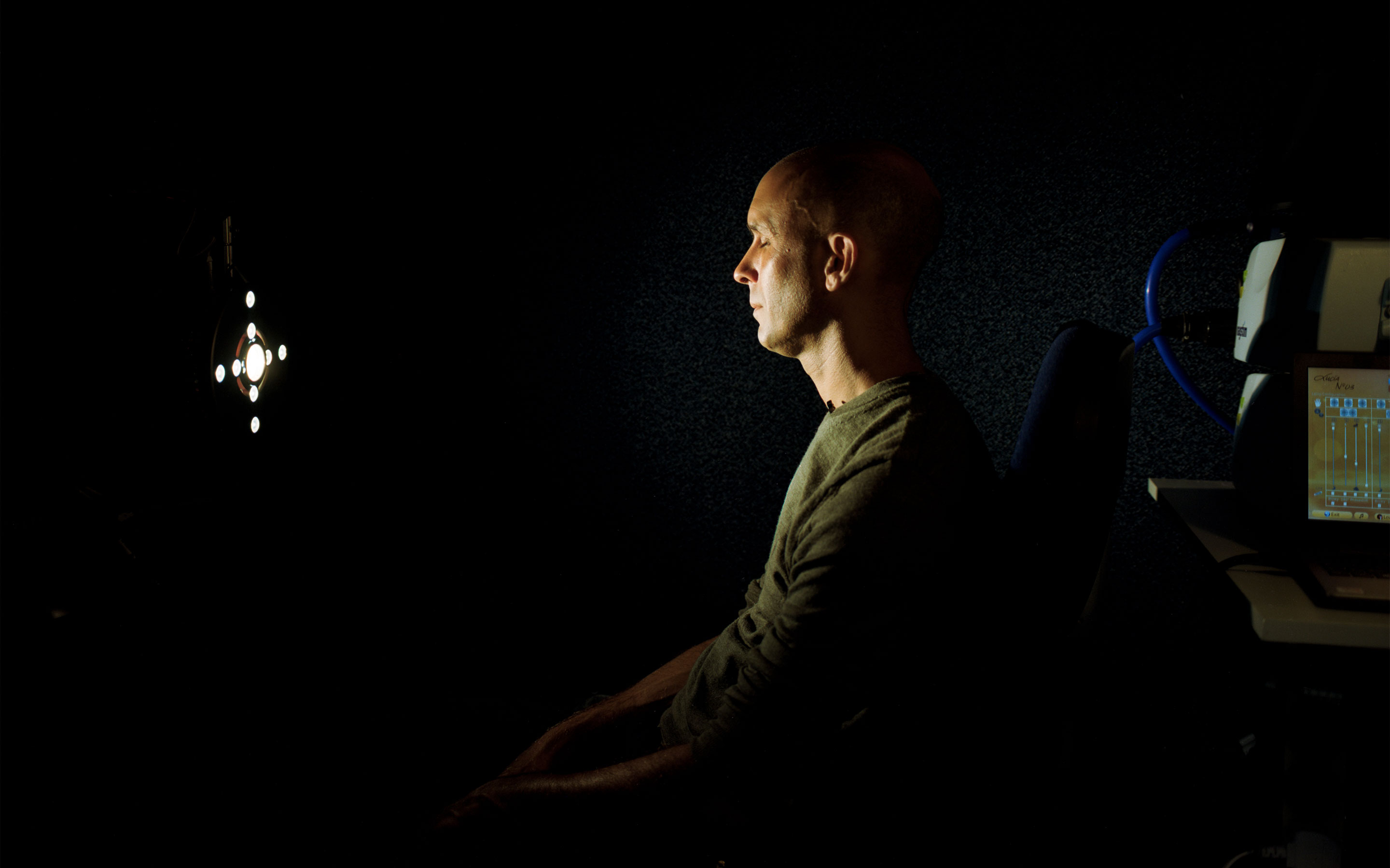 Neuroscientist Anil Seth in his darkened laboratory at the University of Sussex.