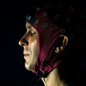 Neuroscientist Anil Seth in his darkened laboratory at the University of Sussex.