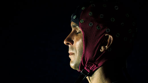 Neuroscientist Anil Seth in his darkened laboratory at the University of Sussex.