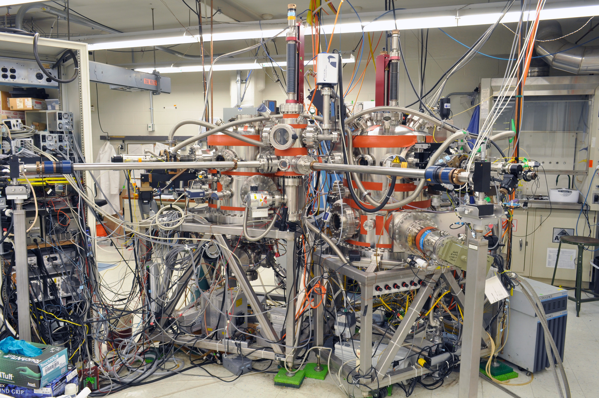 Steel lab equipment with a bunch of wires.