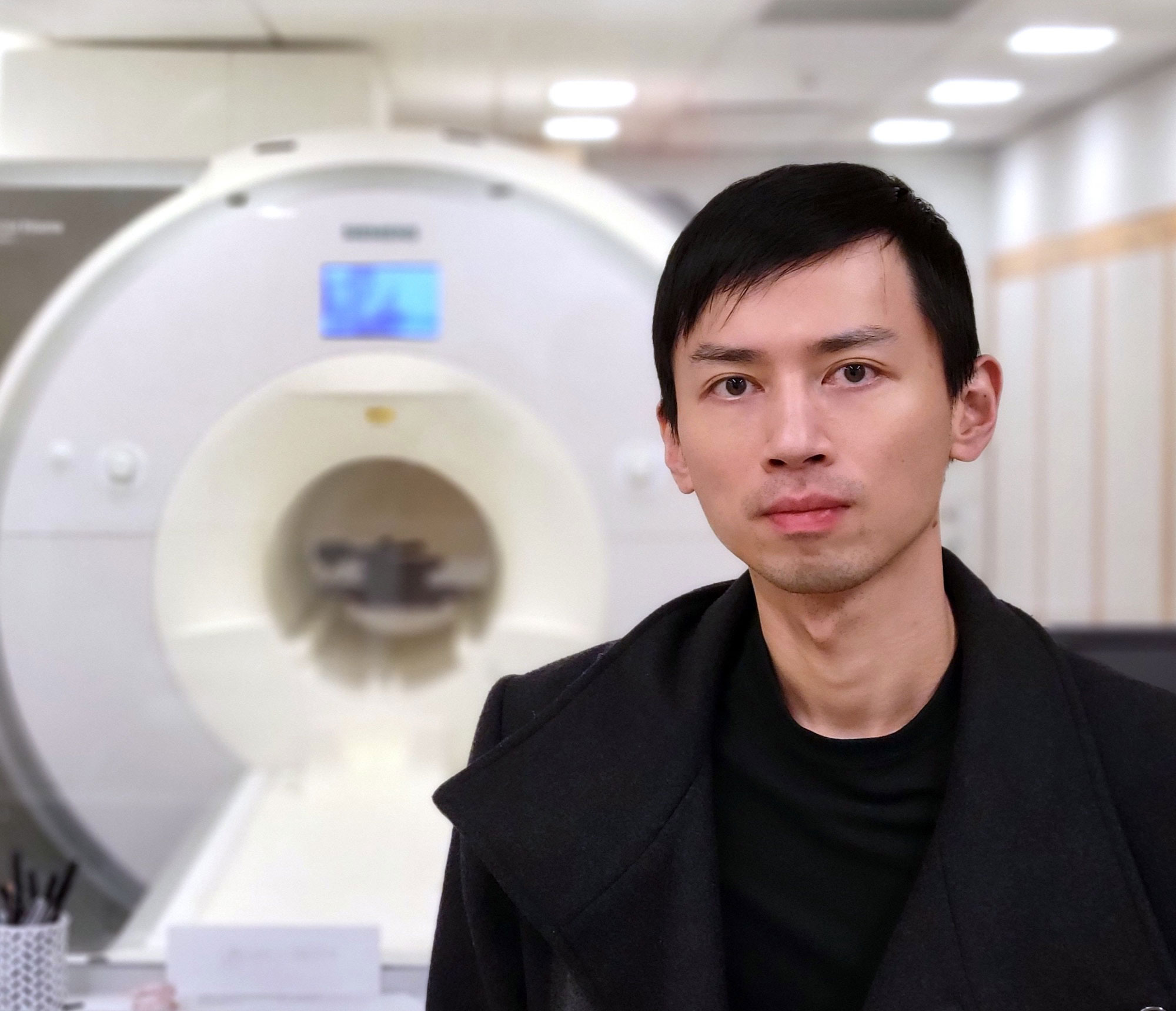 Portrait photo of neuroscience researcher Hsin-Hung Li of New York University.