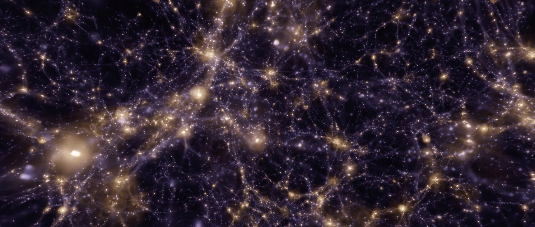 Video that zooms out from a close-up of a few simulated galaxies to a panoramic view of many different cube-shaped universes.