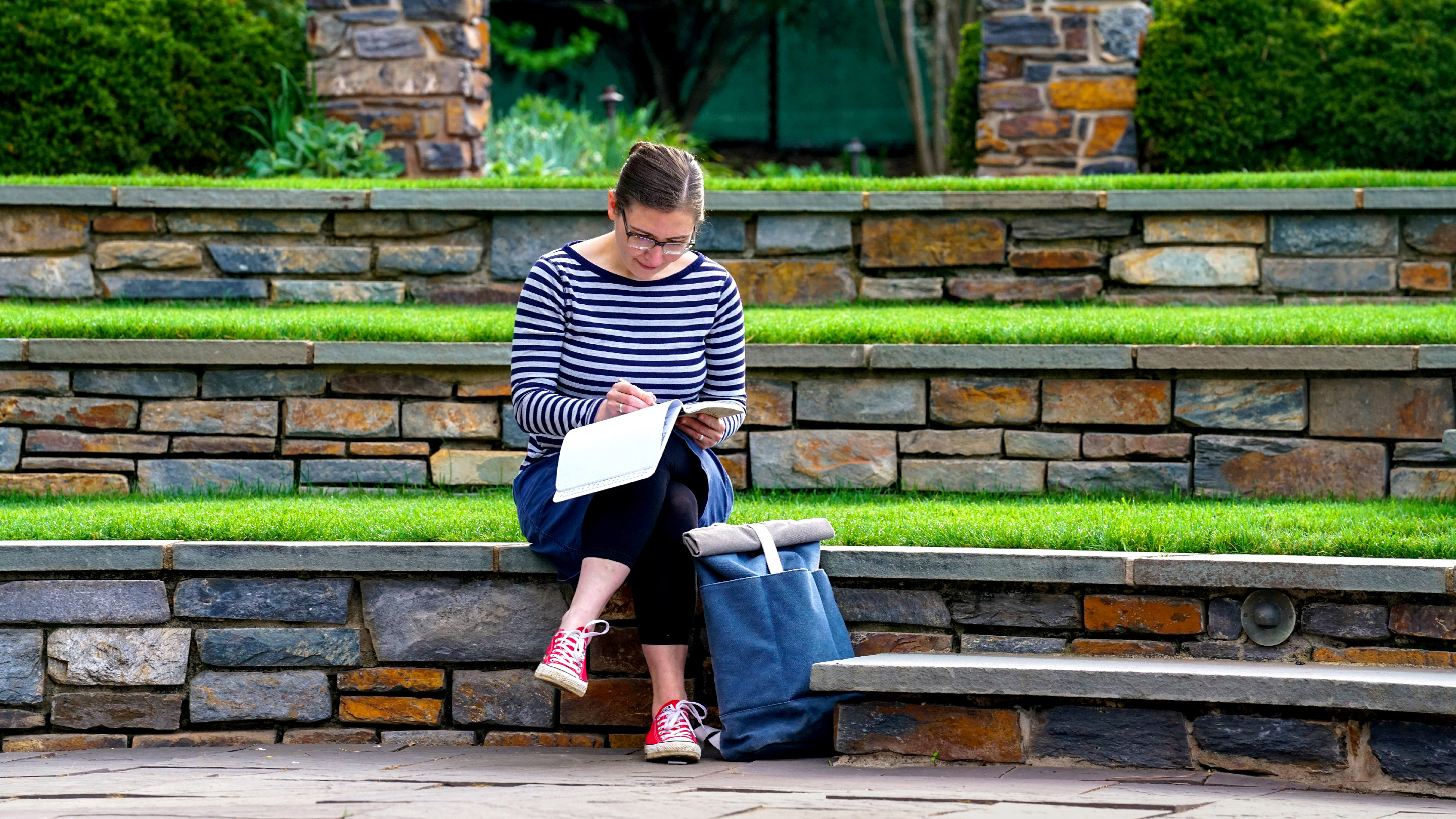 The mathematician Lillian Pierce sitting in Duke Gardens.