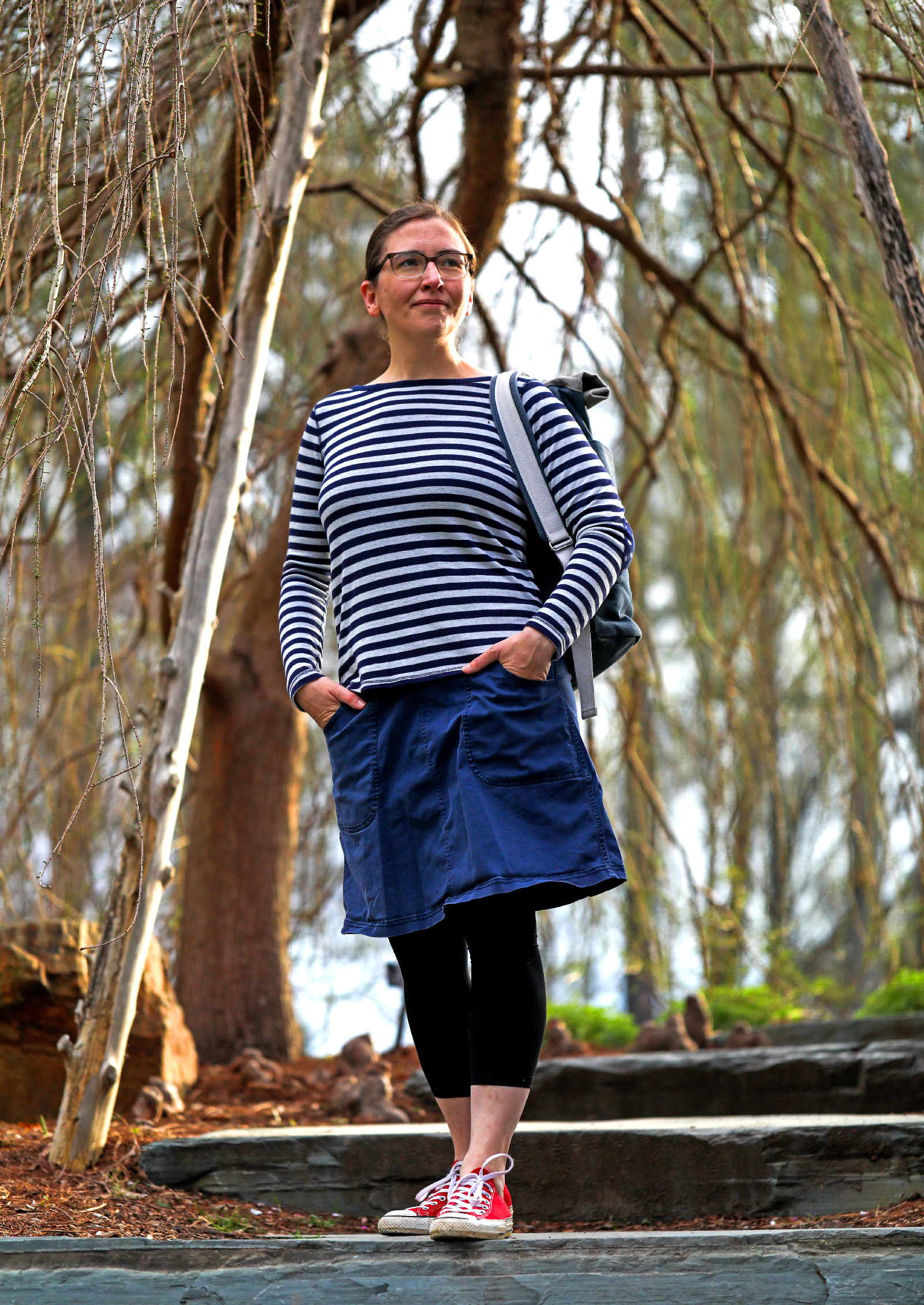 Lillian Pierce walking down steps in Duke Gardens.