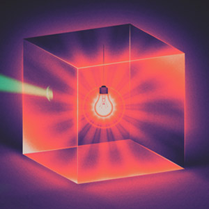 Illustration of a glass box illuminated inside by a red lightbulb. A ray of green light shoots out of the box.