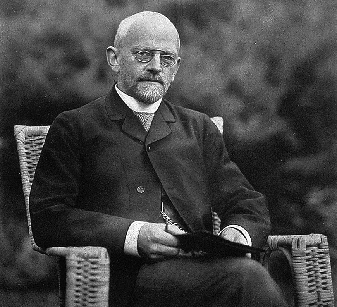 David Hilbert, in a black and white photo, sitting down.