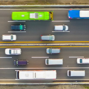 Aerial view of a complicated interchange full of flowing traffic