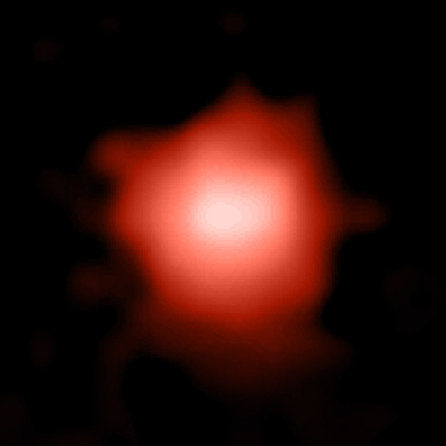 A blurry blob of light that’s white in the center and red around the edges.]