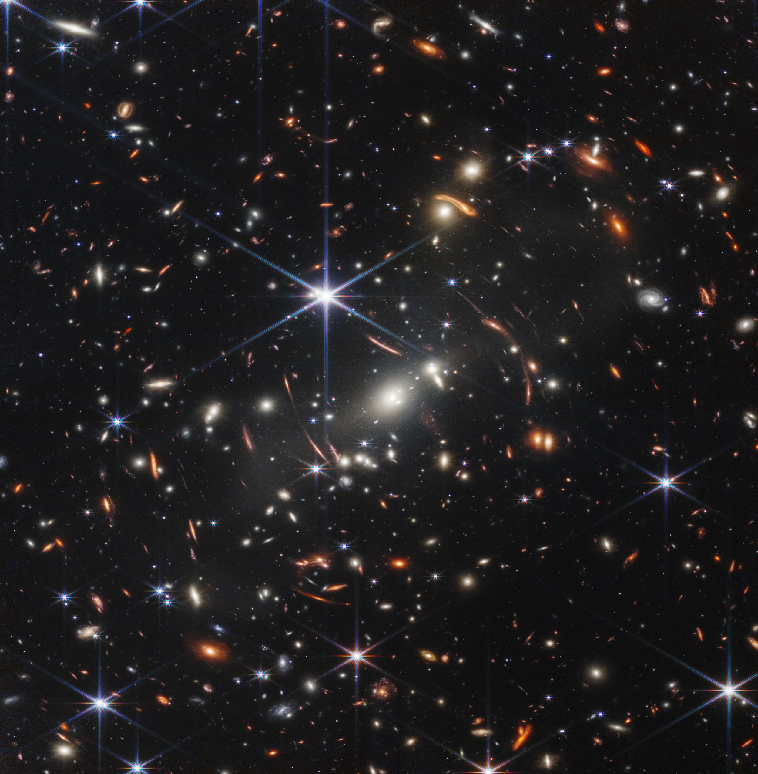 An image of thousands of galaxies with diverse shapes and colors.]