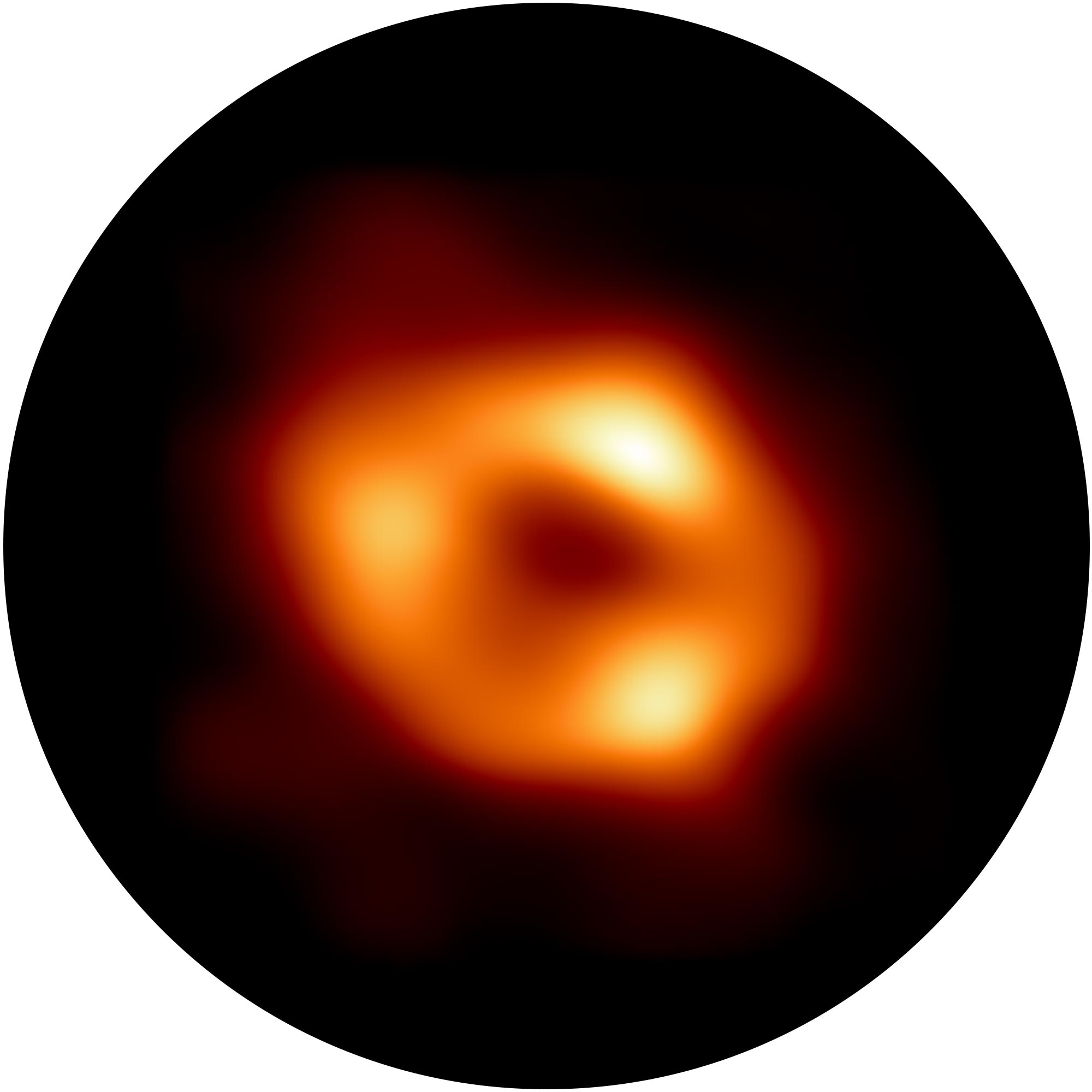 blurry orange ring of light encircles a black hole