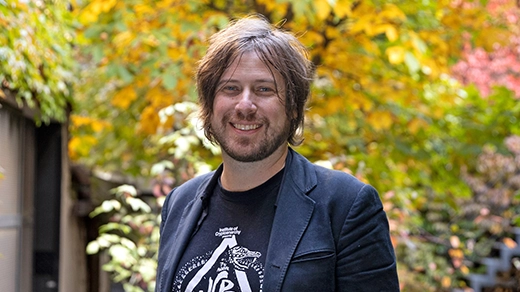 Harry Halpin in a T-shirt and sports coat outdoors