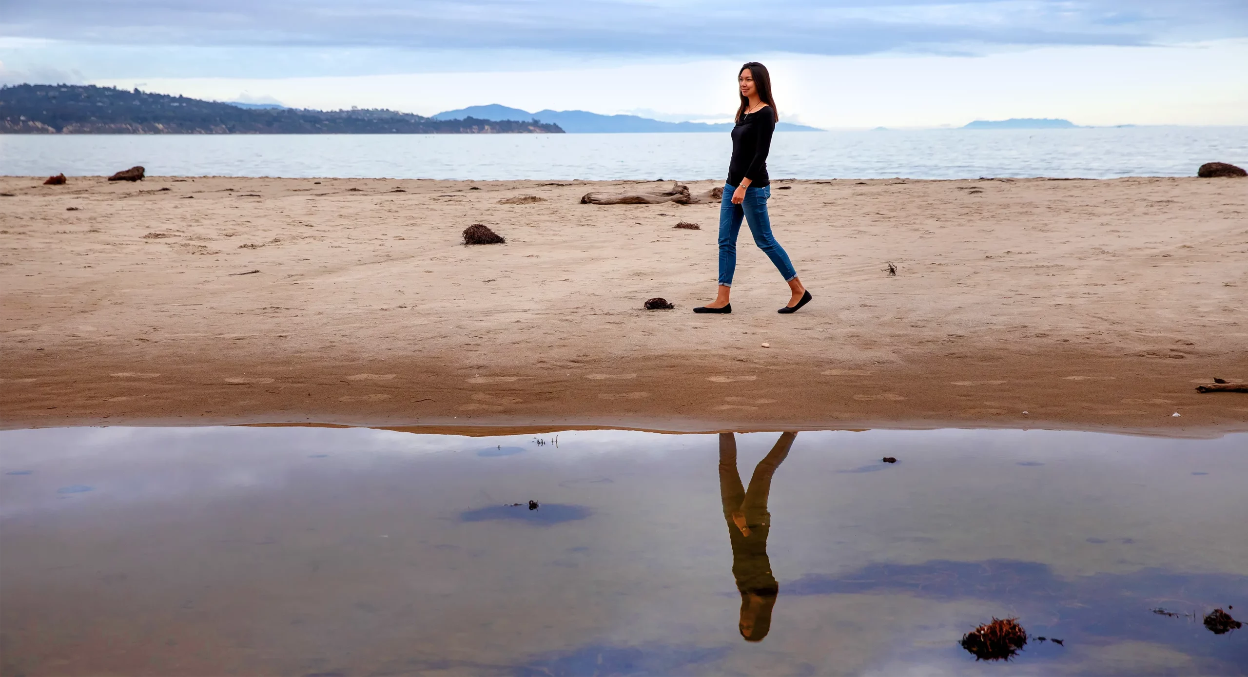 Moeller walks along Campus Point Beach near the University of California, Santa Barbara.