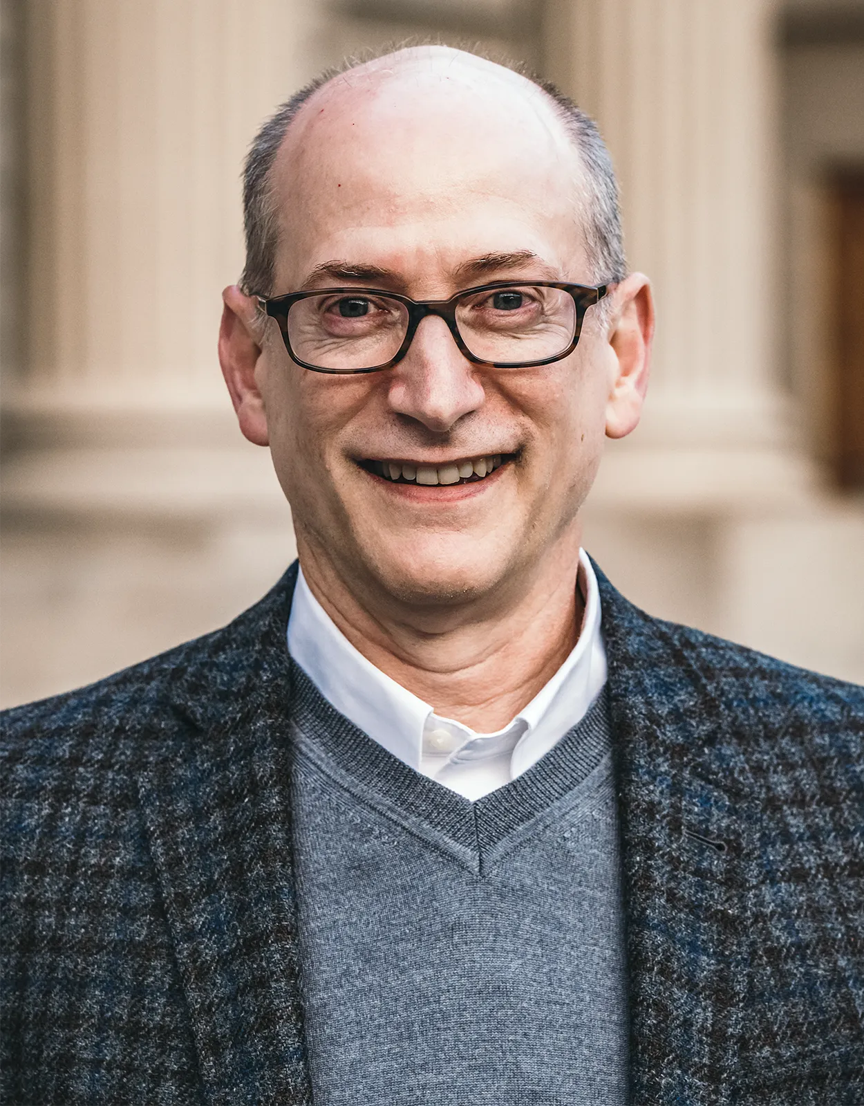 John Krystal standing in front of a laboratory at Yale University.