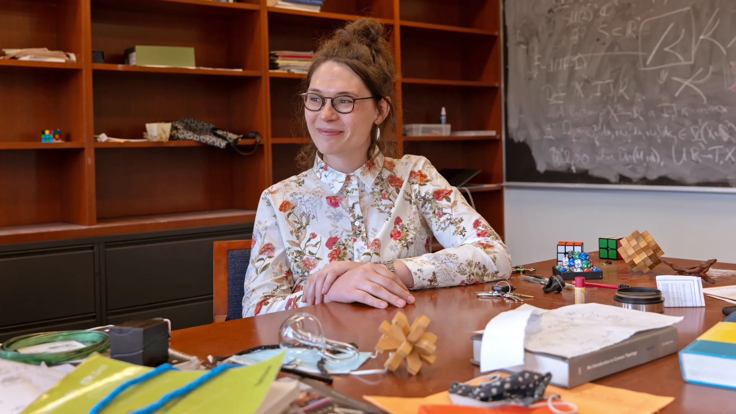 The mathematician Emmy Murphy sitting behind her desk at Princeton University last month.