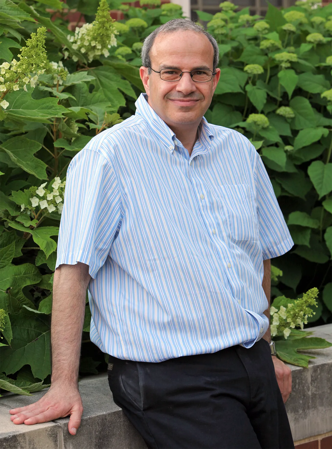 A man in a blue shirt