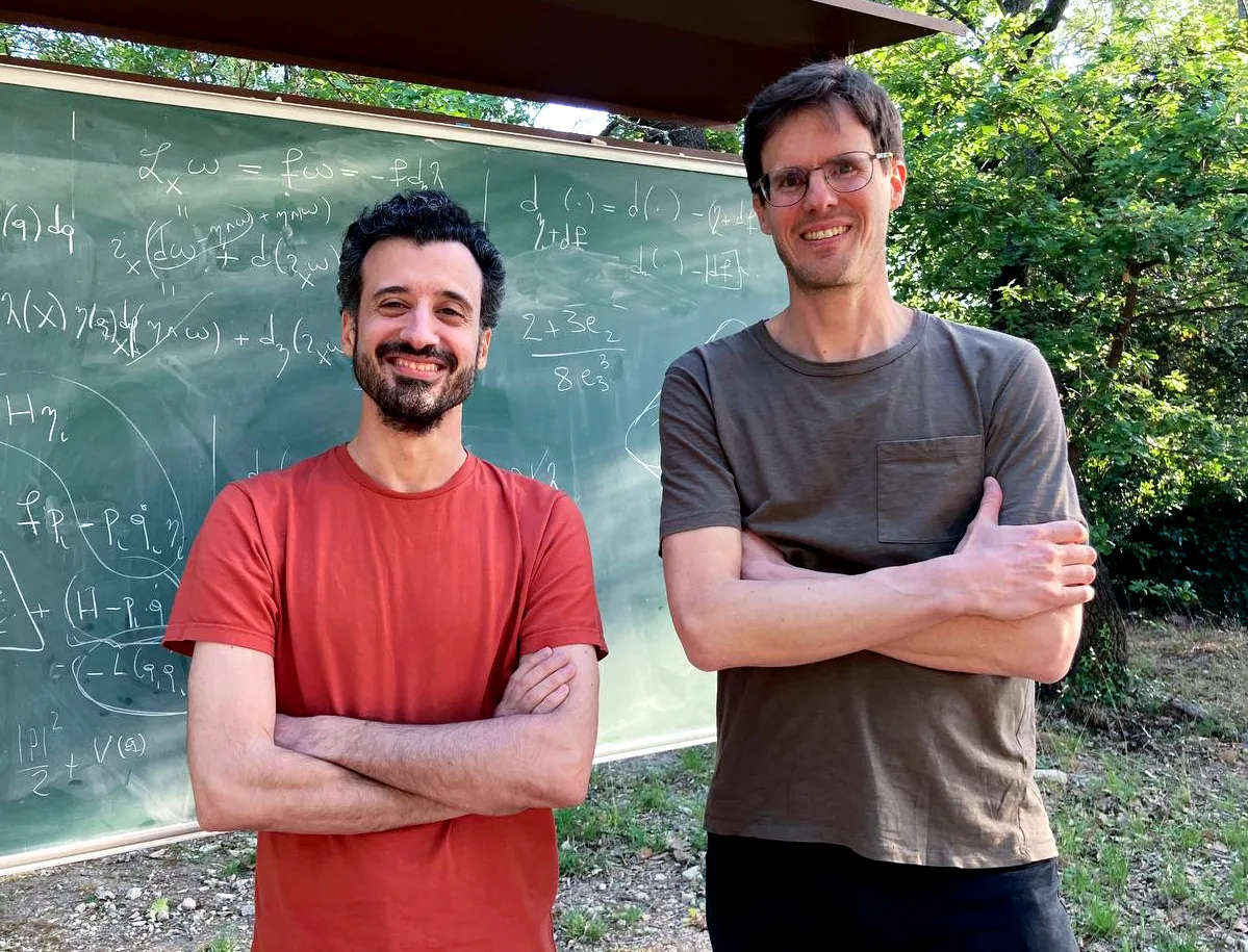 A portrait of mathematicians Marcel Guárdia and Jacques Fejos.