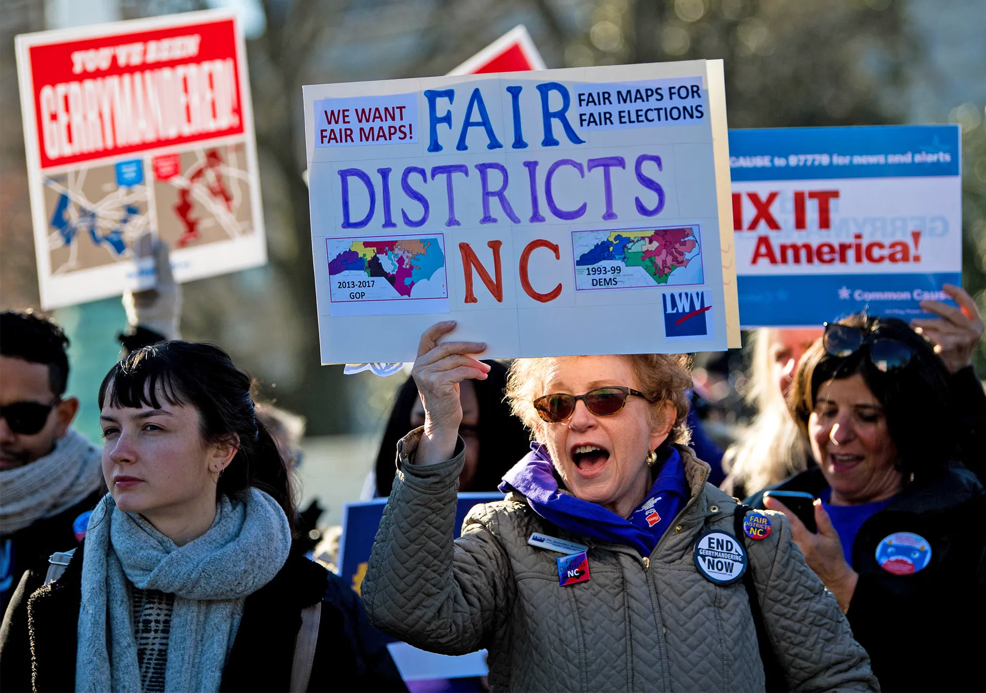 A demonstrator protesting outside the Supreme Court in Washington, DC in March 2019, on a day when the court was hearing arguments in two gerrymandering cases.