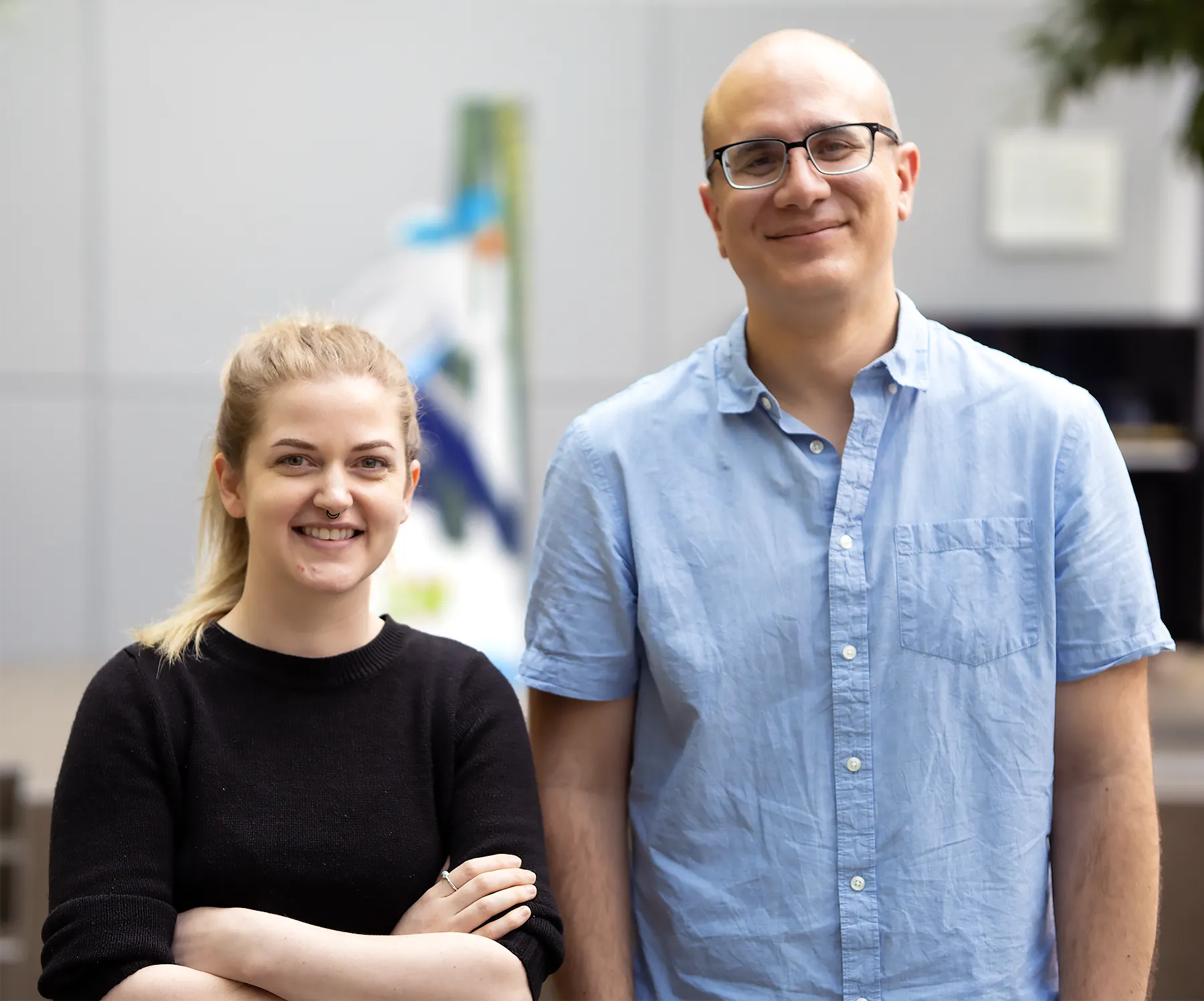 Researchers Sonya Widen and Alejandro Burga standing in Burga’s laboratory at the Institute of Molecular Biotechnology.